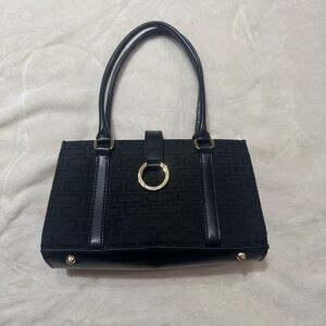 Chic Black Shoulder Bag with Gold Ring Detail